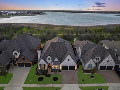 LAKE VIEW Highland built SINGLE STORY home is located in highly on The Tribute At the Colony in Texas - for sale on GolfHomes.com, golf home, golf lot