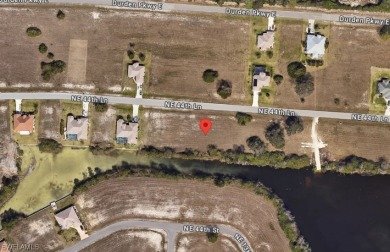 Beautiful lot for sale in Cape Coral, Florida! This lot is near on Del Tura Golf and Country Club in Florida - for sale on GolfHomes.com, golf home, golf lot