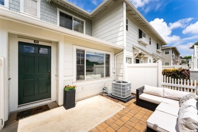 Discover the charm of this rarely available 2-bd 2.5-bath split on Hoakalei Country Club At Ocean Pointe in Hawaii - for sale on GolfHomes.com, golf home, golf lot