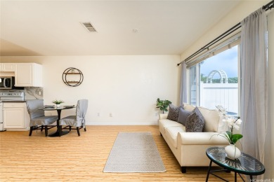 Discover the charm of this rarely available 2-bd 2.5-bath split on Hoakalei Country Club At Ocean Pointe in Hawaii - for sale on GolfHomes.com, golf home, golf lot