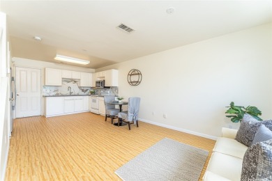 Discover the charm of this rarely available 2-bd 2.5-bath split on Hoakalei Country Club At Ocean Pointe in Hawaii - for sale on GolfHomes.com, golf home, golf lot
