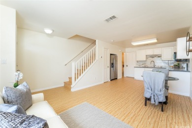 Discover the charm of this rarely available 2-bd 2.5-bath split on Hoakalei Country Club At Ocean Pointe in Hawaii - for sale on GolfHomes.com, golf home, golf lot