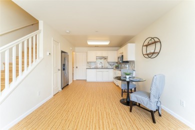 Discover the charm of this rarely available 2-bd 2.5-bath split on Hoakalei Country Club At Ocean Pointe in Hawaii - for sale on GolfHomes.com, golf home, golf lot