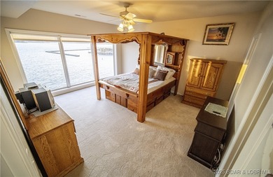 This isn't just a condo - it's a lifestyle! Wake up to sparkling on Seasons Ridge At Four Seasons in Missouri - for sale on GolfHomes.com, golf home, golf lot