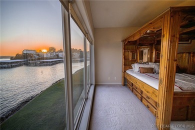 This isn't just a condo - it's a lifestyle! Wake up to sparkling on Seasons Ridge At Four Seasons in Missouri - for sale on GolfHomes.com, golf home, golf lot