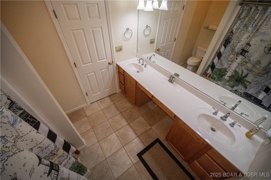 This isn't just a condo - it's a lifestyle! Wake up to sparkling on Seasons Ridge At Four Seasons in Missouri - for sale on GolfHomes.com, golf home, golf lot