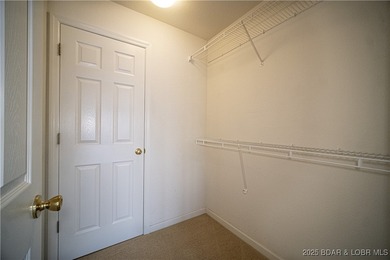 This isn't just a condo - it's a lifestyle! Wake up to sparkling on Seasons Ridge At Four Seasons in Missouri - for sale on GolfHomes.com, golf home, golf lot