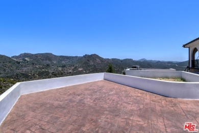 Welcome to the Luxury Malibu Crown Vineyard Estate, brand new on Malibu Country Club in California - for sale on GolfHomes.com, golf home, golf lot
