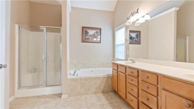 Discover this beautifully maintained 5-bedroom, 3.5 bath home on Summergrove Golf Club in Georgia - for sale on GolfHomes.com, golf home, golf lot
