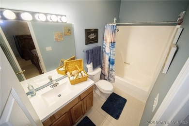 This isn't just a condo - it's a lifestyle! Wake up to sparkling on Seasons Ridge At Four Seasons in Missouri - for sale on GolfHomes.com, golf home, golf lot