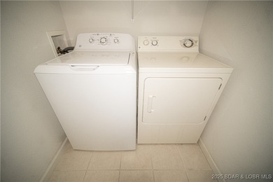 This isn't just a condo - it's a lifestyle! Wake up to sparkling on Seasons Ridge At Four Seasons in Missouri - for sale on GolfHomes.com, golf home, golf lot