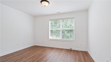 Discover this beautifully maintained 5-bedroom, 3.5 bath home on Summergrove Golf Club in Georgia - for sale on GolfHomes.com, golf home, golf lot