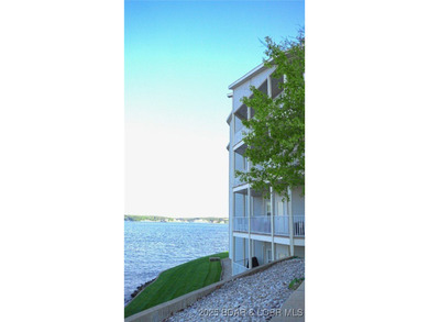 This isn't just a condo - it's a lifestyle! Wake up to sparkling on Seasons Ridge At Four Seasons in Missouri - for sale on GolfHomes.com, golf home, golf lot