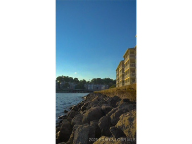 This isn't just a condo - it's a lifestyle! Wake up to sparkling on Seasons Ridge At Four Seasons in Missouri - for sale on GolfHomes.com, golf home, golf lot