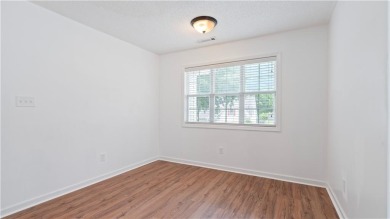 Discover this beautifully maintained 5-bedroom, 3.5 bath home on Summergrove Golf Club in Georgia - for sale on GolfHomes.com, golf home, golf lot