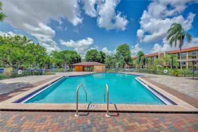 Live the resort-style life you deserve in this 2-bedroom on Flamingo Lakes Country Club in Florida - for sale on GolfHomes.com, golf home, golf lot