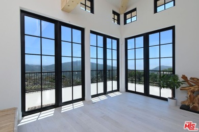 Welcome to the Luxury Malibu Crown Vineyard Estate, brand new on Malibu Country Club in California - for sale on GolfHomes.com, golf home, golf lot