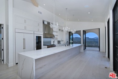 Welcome to the Luxury Malibu Crown Vineyard Estate, brand new on Malibu Country Club in California - for sale on GolfHomes.com, golf home, golf lot