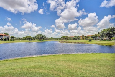 Live the resort-style life you deserve in this 2-bedroom on Flamingo Lakes Country Club in Florida - for sale on GolfHomes.com, golf home, golf lot