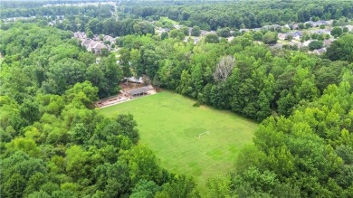 Discover this beautifully maintained 5-bedroom, 3.5 bath home on Summergrove Golf Club in Georgia - for sale on GolfHomes.com, golf home, golf lot