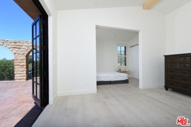 Welcome to the Luxury Malibu Crown Vineyard Estate, brand new on Malibu Country Club in California - for sale on GolfHomes.com, golf home, golf lot