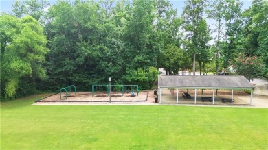 Discover this beautifully maintained 5-bedroom, 3.5 bath home on Summergrove Golf Club in Georgia - for sale on GolfHomes.com, golf home, golf lot