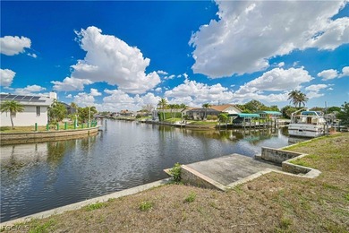 SAILBOAT ACCESS TRIPLE LOT ON INTERSECTING CANAL IN SE CAPE on El Rio Golf Course and Club in Florida - for sale on GolfHomes.com, golf home, golf lot