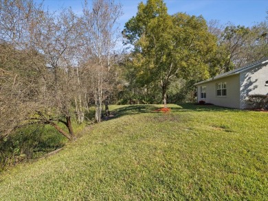 Discover the perfect blend of charm and convenience in this on Summertree Golf Course in Florida - for sale on GolfHomes.com, golf home, golf lot