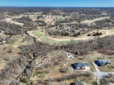 You have to see this breathtaking home in Loma Linda! This on The Bald Eagle Course At Eagle Creek Golf Club in Missouri - for sale on GolfHomes.com, golf home, golf lot