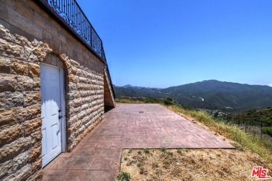 Welcome to the Luxury Malibu Crown Vineyard Estate, brand new on Malibu Country Club in California - for sale on GolfHomes.com, golf home, golf lot