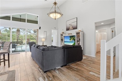 Experience sweeping 180-degree water and golf course views from on  in Florida - for sale on GolfHomes.com, golf home, golf lot