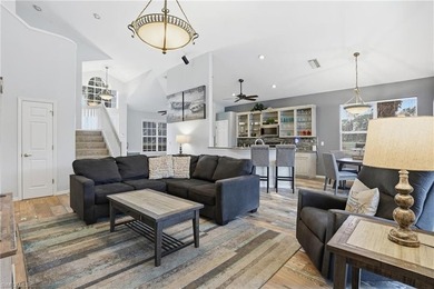 Experience sweeping 180-degree water and golf course views from on  in Florida - for sale on GolfHomes.com, golf home, golf lot