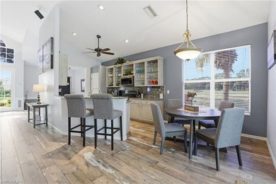 Experience sweeping 180-degree water and golf course views from on  in Florida - for sale on GolfHomes.com, golf home, golf lot