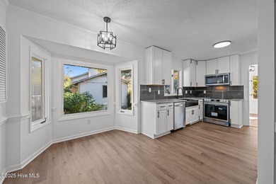 Welcome to 309 Channel Run, a stunning 3-bedroom, 2-bath home on River Bend Golf and Country Club in North Carolina - for sale on GolfHomes.com, golf home, golf lot