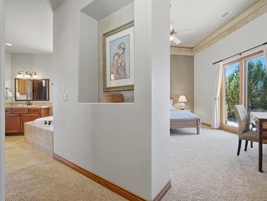 This spacious Mediterranean style patio home in the heart of The on The Golf Club At Redlands Mesa in Colorado - for sale on GolfHomes.com, golf home, golf lot