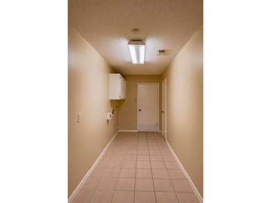 3/3 home on the Riverhill golf course that overlooks Fairway #13 on Riverhill Country Club in Texas - for sale on GolfHomes.com, golf home, golf lot