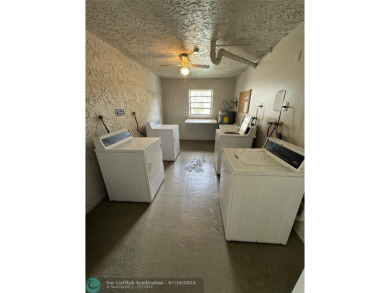 Beautiful bright and airy unit overlooking the lake and on Pine Island Ridge Country Club in Florida - for sale on GolfHomes.com, golf home, golf lot