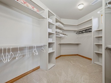 This spacious Mediterranean style patio home in the heart of The on The Golf Club At Redlands Mesa in Colorado - for sale on GolfHomes.com, golf home, golf lot