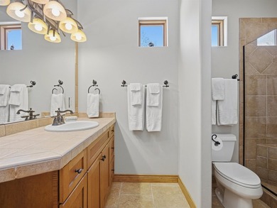 This spacious Mediterranean style patio home in the heart of The on The Golf Club At Redlands Mesa in Colorado - for sale on GolfHomes.com, golf home, golf lot