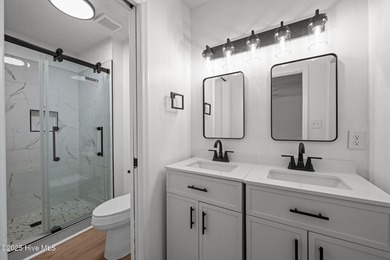 Welcome to 309 Channel Run, a stunning 3-bedroom, 2-bath home on River Bend Golf and Country Club in North Carolina - for sale on GolfHomes.com, golf home, golf lot