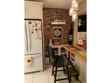 Looking for a Goldilocks Villa - not too big and not too small - on Meadow Oaks Golf and Country Club in Florida - for sale on GolfHomes.com, golf home, golf lot