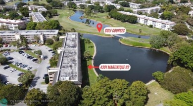 BACK ON THE MARKET WITH NEW KITCHEN WATERFALL COUNTERTOP AND on Wynmoor Golf Course in Florida - for sale on GolfHomes.com, golf home, golf lot