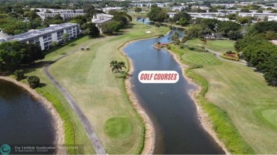 BACK ON THE MARKET WITH NEW KITCHEN WATERFALL COUNTERTOP AND on Wynmoor Golf Course in Florida - for sale on GolfHomes.com, golf home, golf lot