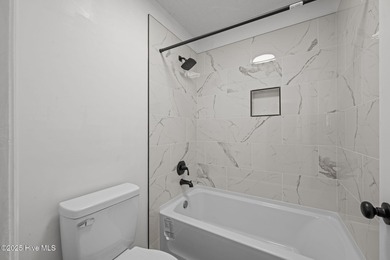 Welcome to 309 Channel Run, a stunning 3-bedroom, 2-bath home on River Bend Golf and Country Club in North Carolina - for sale on GolfHomes.com, golf home, golf lot