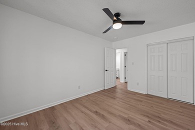 Welcome to 309 Channel Run, a stunning 3-bedroom, 2-bath home on River Bend Golf and Country Club in North Carolina - for sale on GolfHomes.com, golf home, golf lot