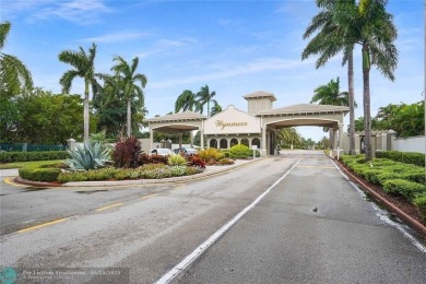 BACK ON THE MARKET WITH NEW KITCHEN WATERFALL COUNTERTOP AND on Wynmoor Golf Course in Florida - for sale on GolfHomes.com, golf home, golf lot