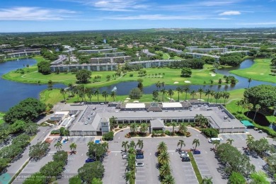 BACK ON THE MARKET WITH NEW KITCHEN WATERFALL COUNTERTOP AND on Wynmoor Golf Course in Florida - for sale on GolfHomes.com, golf home, golf lot