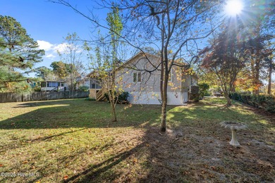 Welcome to 309 Channel Run, a stunning 3-bedroom, 2-bath home on River Bend Golf and Country Club in North Carolina - for sale on GolfHomes.com, golf home, golf lot