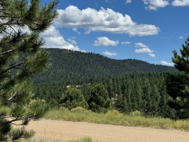 VIEWS!!! This easy-to-build-on lot has everything, because few on Angel Fire Resort Country Club in New Mexico - for sale on GolfHomes.com, golf home, golf lot