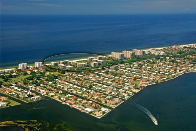 Under contract-accepting backup offers. Beachfront living at its on Longboat Key Golf Club in Florida - for sale on GolfHomes.com, golf home, golf lot